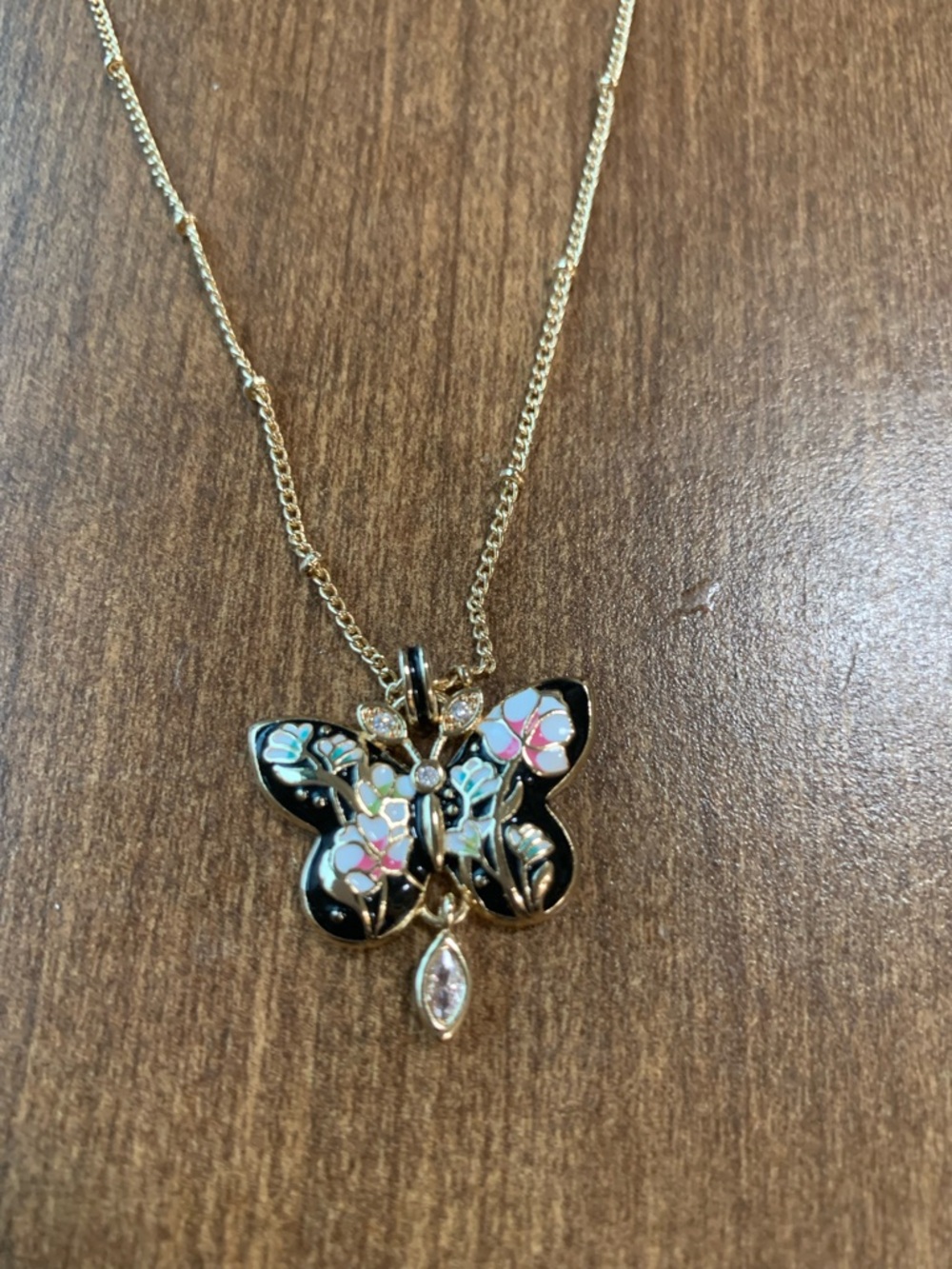 Gold Butterfly Pendant Necklace with Black Enamel and Pastel Floral Inlay